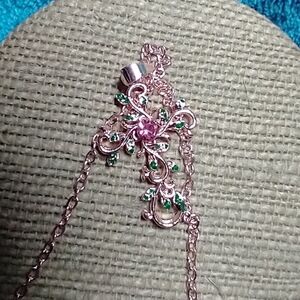 Goldtone pink stone green leaves scroll Christian Catholic cross chain necklace
